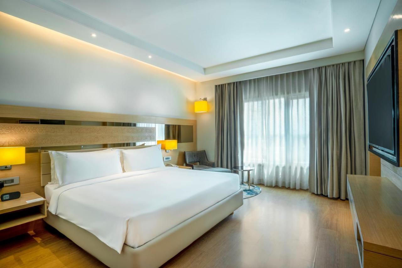 Holiday Inn Agra Mg Road An Ihg Hotel Kültér fotó A room at the hotel